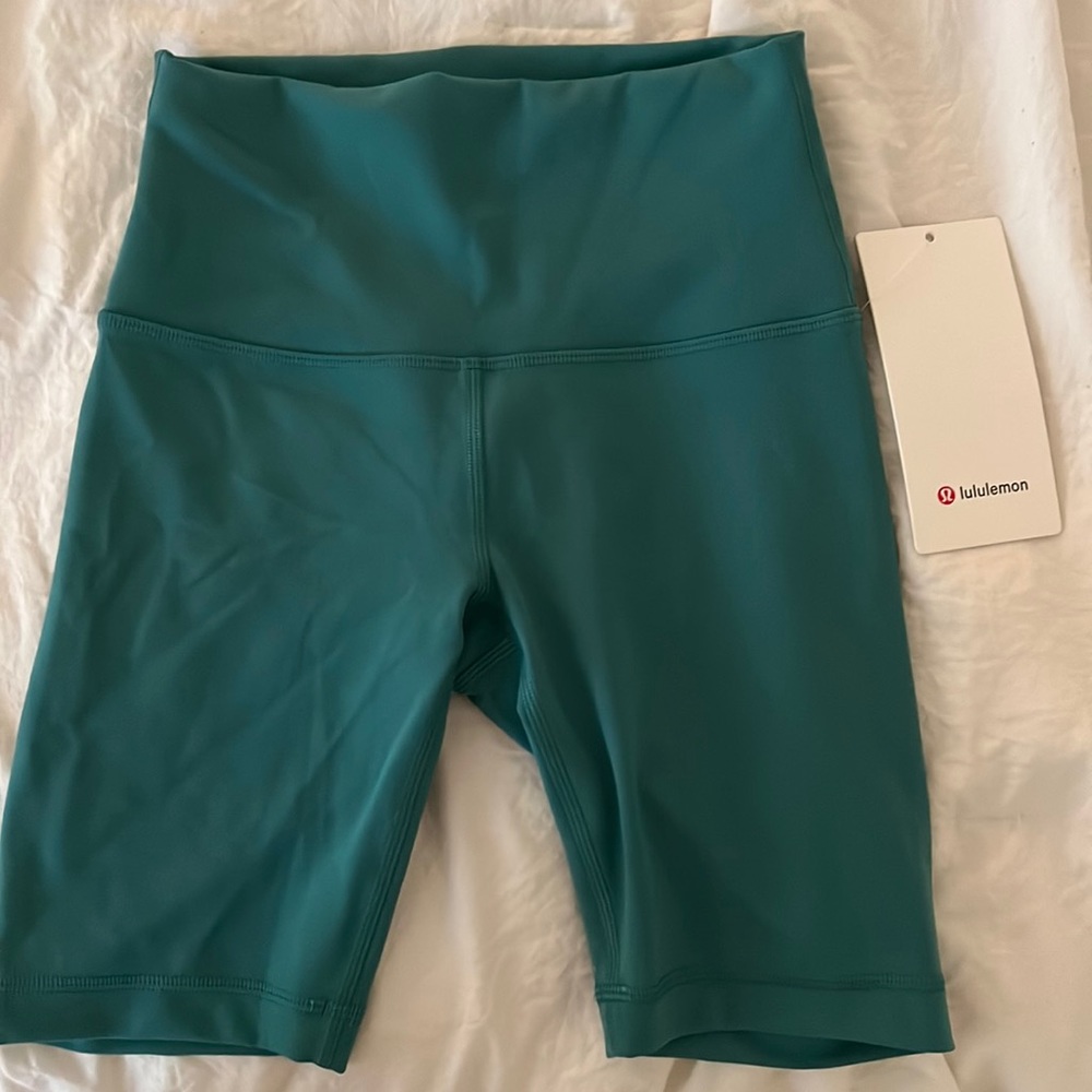 Size 4 teal Lululemon 8” biker shorts